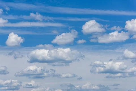 Clouds in a blue sky Stock Photos