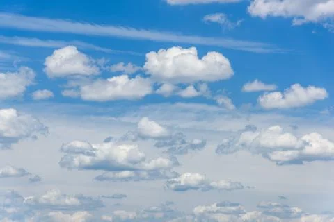 Clouds in a blue sky Stock Photos