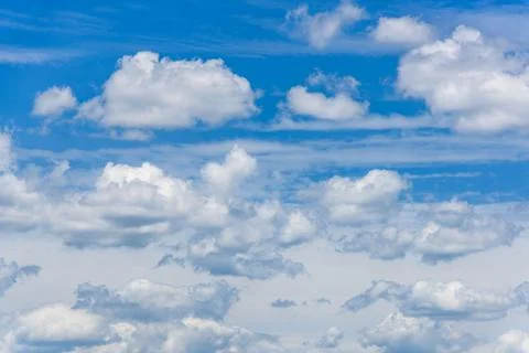 Clouds in a blue sky Stock Photos