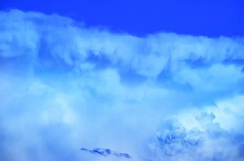 Clouds in the blue sky. Stock Photos