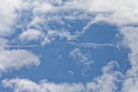Clouds in the blue sky. Stock Photos