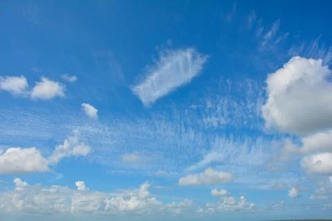 Clouds on the blue sky Stock Photos