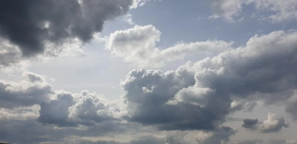 CLOUDS IN THE BLUE SKY Stock Photos