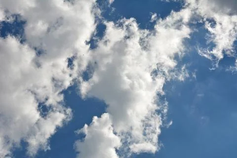 Clouds in the blue sky . Stock Photos