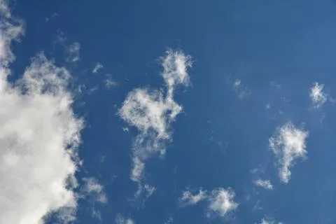 Clouds in the blue sky . Stock Photos