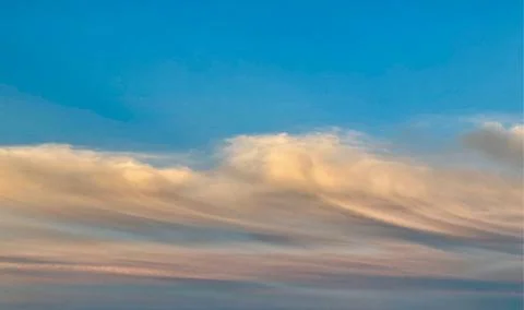 Clouds in the blue sky. Stock Photos