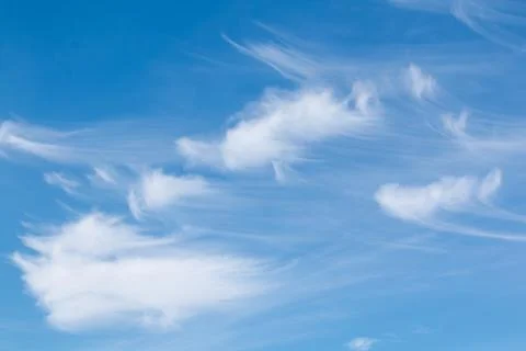 Clouds in a blue sky Stock Photos