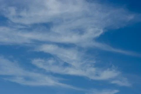 Clouds in a blue sky Stock Photos