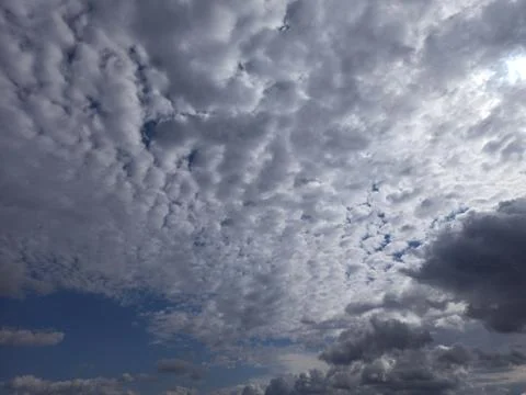 Clouds in the blue sky with place for text. Landscape Stock Photos