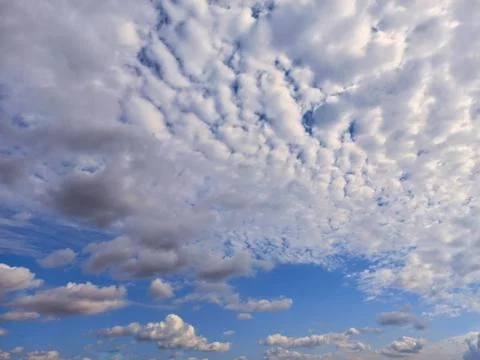 Clouds in the blue sky with place for text. Landscape Stock Photos