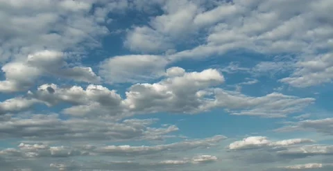 Clouds. Blue sky. Puffy fluffy clouds. Cumulus cloudscape timelapse. Time lapse. Stock Footage 204122913