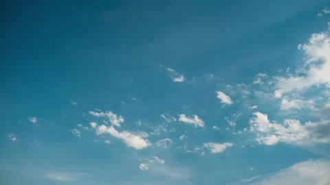 Clouds. Blue sky. Puffy fluffy clouds. Cumulus cloudscape timelapse. Stock Footage 205027647
