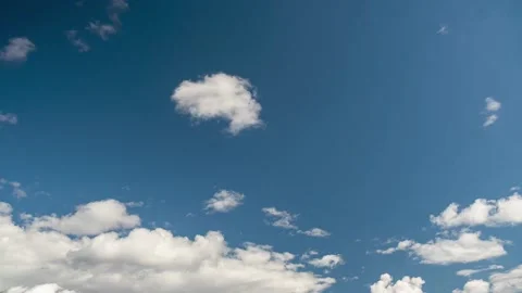 Clouds. Blue sky. Puffy fluffy clouds. Cumulus cloudscape timelapse. Stock Footage 206734075