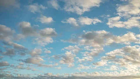 Clouds. Blue sky. Puffy fluffy Alto Cirrus Nimbo Clouds. Stock Footage 227328022