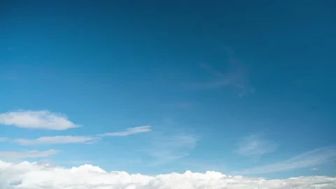 Clouds. Blue sky. Puffy fluffy Alto Cirrus Nimbo Clouds. Stock Footage 227328798