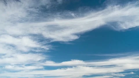 Clouds. Blue sky. Puffy fluffy Alto Cirrus Nimbo Clouds. Stock Footage 227329013