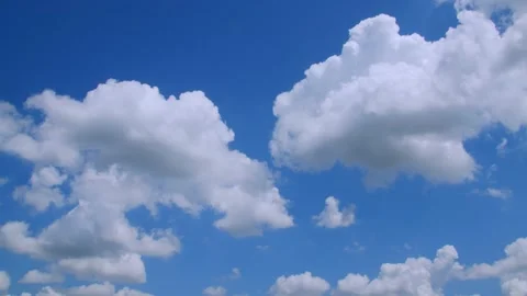 Clouds in a blue sky on a spring day. 4k60p Stock Footage 132219484