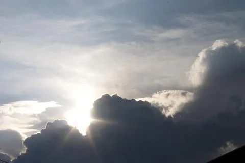 Clouds in the blue sky at sunset as a background image. Stock Photos