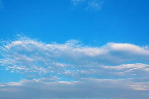 Clouds in the bright sky. Stock Photos