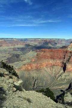 Clouds cast shadow over grand canyon Stock Photos