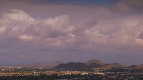 Clouds cast shadows over desert city in Phoenix, Arizona Stock Footage 73746746