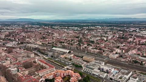 Clouds casting ethereal patterns over Avignon's aerial panorama. Stock Footage 250917997