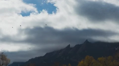 Clouds churning over Boulder mountains, Colorado  Stock Footage 57734177