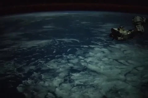 Clouds, City Lights, and Lightning from the International Space Station Stock Footage 261678502