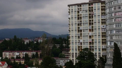 Clouds, city, mountains Stock Footage 74356653