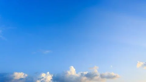 Clouds on clear blue sky Stock Photos