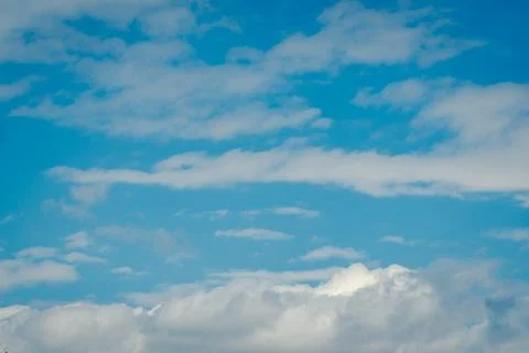 Clouds in the clear sky  Stock Photos
