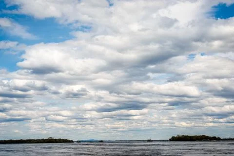 Clouds in the clear sky  Stock Photos
