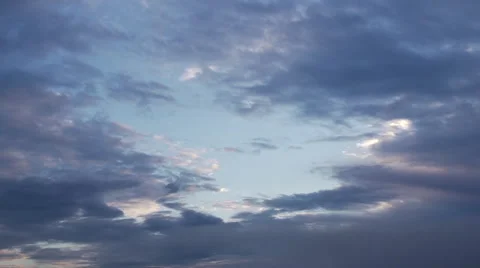 Clouds closing in on a blue sky hole Stock Footage 53237933
