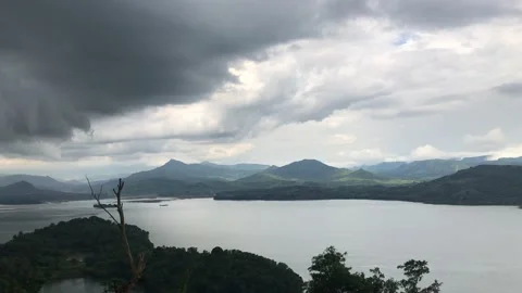 Clouds cloud over vast hills and lakes Stock Footage 132548231
