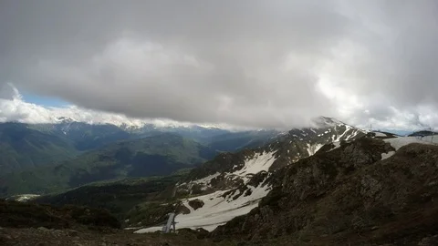 Clouds come down from the mountains in the afternoon. Sochi. Russia. Time lapse Stock Footage
