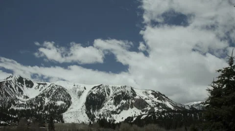 CLOUDS COME OVER THE MOUNTAINS Stock Footage 5701178