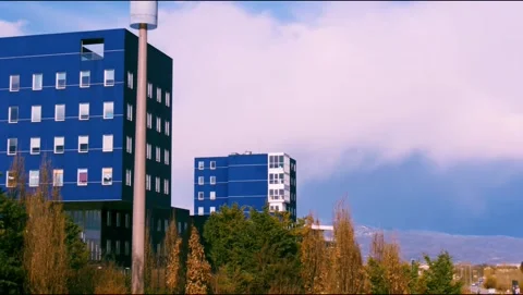 Clouds comes out from Blue Palace in Skyline timelapse in purple 4k Stock Footage 150578940
