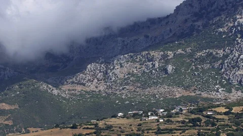 Clouds coming down like water from Atlas mountain range Stockbeeldmateriaal 111219025
