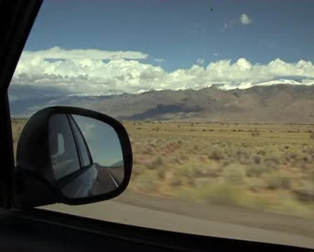 Clouds coming over snow mountain - 720x576 Anmorphic Stockbeeldmateriaal 12686606