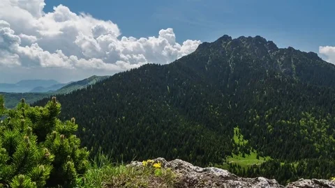 Clouds convection in mountains time lapse. Dolly shot look out of rocks Stock Footage 69143756