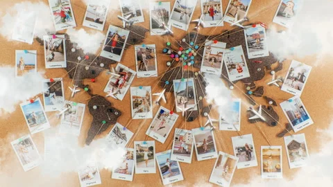 Clouds, cork board world map, printed photographs of woman, travel destinations Stock Footage 266679247