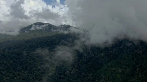 Clouds cover the mountainside Stock Footage 112737767
