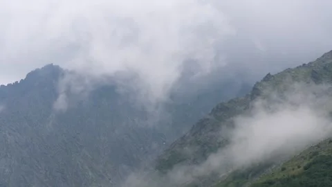 Clouds cover the view on mountains. Timelapse. Subpolar Ural. Uralic Mountains Stock Footage 269133377