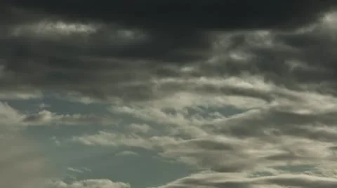 Clouds covering sky at sunset time-lapse Stock Footage 12320460