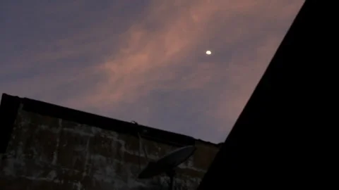 Clouds, Dark Building, Faraway Moon Video stock 341624424