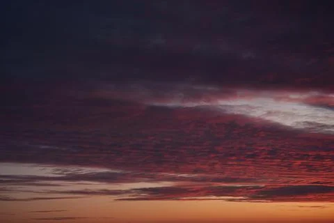 Clouds Dark purple sky with clouds. Sunset. Heavenly landscape. Stock Photos