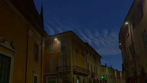 Clouds at dawn behind the houses, in a small Italian village Stock Footage 123069926