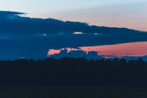 Clouds at dawn on a summer night Stock Photos