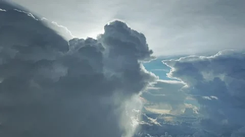 Clouds in the daylight TS near passing med alt between day Stock Footage 280094340