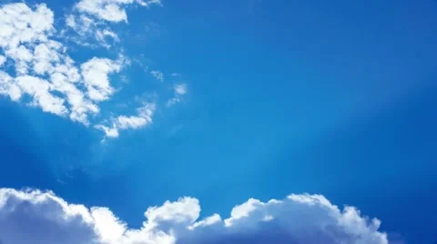 Clouds, deep blue sky and sun rays timelapse Stock Footage 41552948
